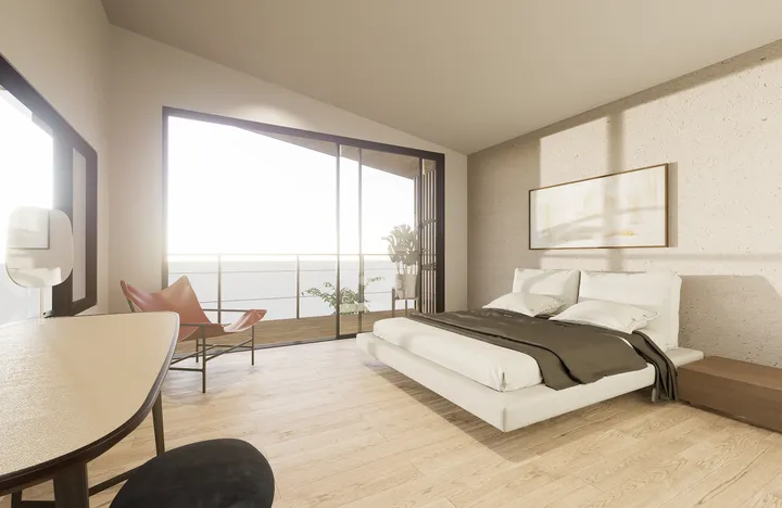 Dormitorio moderno y minimalista con vista panorámica al océano, con una cama de plataforma baja con ropa de cama blanca, un sillón de cuero y una mesa de noche de madera. Puertas corredizas de vidrio conducen a un balcón, permitiendo que la luz natural i