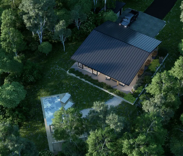 Vivienda de estilo contemporáneo con techo oscuro y piscina en terraza de madera, ubicada en un entorno natural rodeado de árboles.