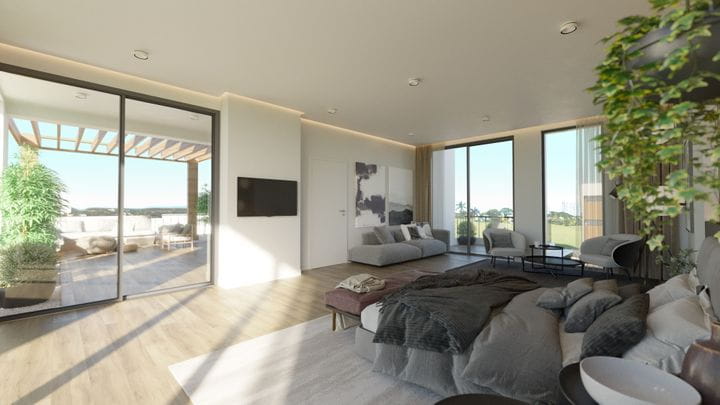 Dormitorio principal con terraza privada y amplios ventanales